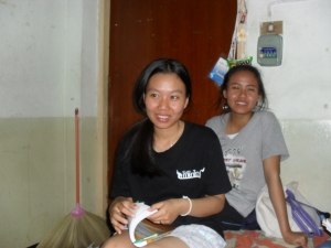 Natjanan (front) and Nittaya in the small room