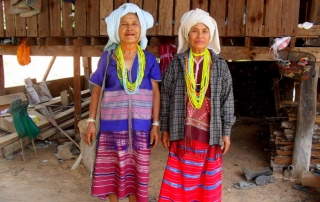 Pim's (another student at Jen's House) grandmother and her friend. They wear traditional Karen clothing and beads. The beads are worn because they are beautiful.  This picture was taken at Ni ki's brother's house during the string tying ceremony, which occurs every year.